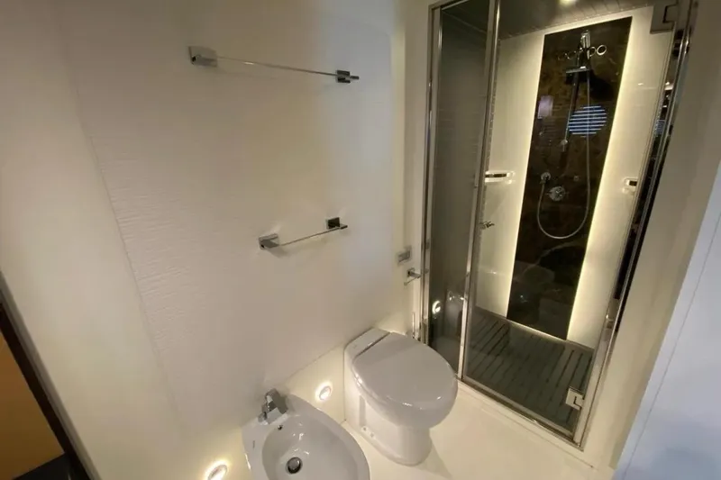 Titta Yacht Photos Pics Luxurious bathroom in 2016 Azimut 77S yacht with modern shower and fixtures.
