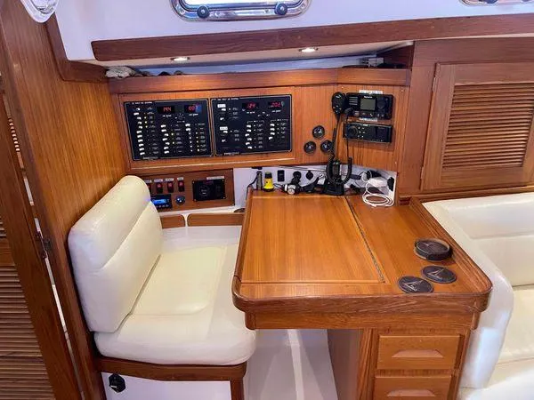 Top O Nok Yacht Photos Pics Luxurious Tartan 395 yacht interior with navigation panel and seating, 2020 model.