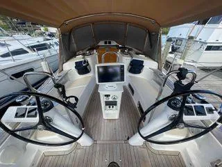 Top O Nok Yacht Photos Pics 2020 Tartan 395 yacht cockpit with dual steering wheels and navigation display.