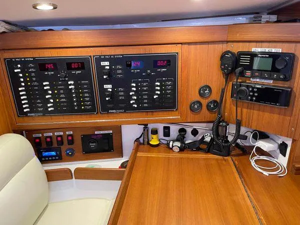 Top O Nok Yacht Photos Pics Control panel inside a 2020 Tartan 395 yacht, featuring navigation and communication equipment.