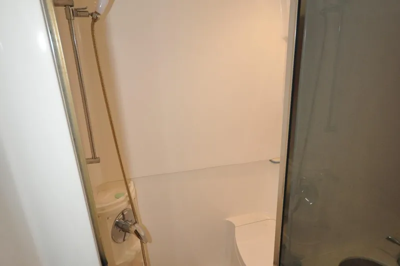  Yacht Photos Pics Shower area in 2009 Intrepid 430 Sport Yacht bathroom.