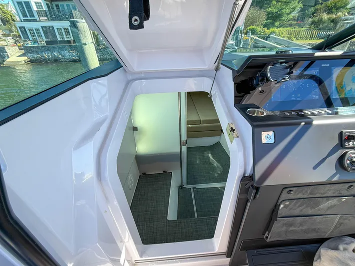  Yacht Photos Pics Interior view of 2022 Axopar 37 Sun Top boat cabin entrance.