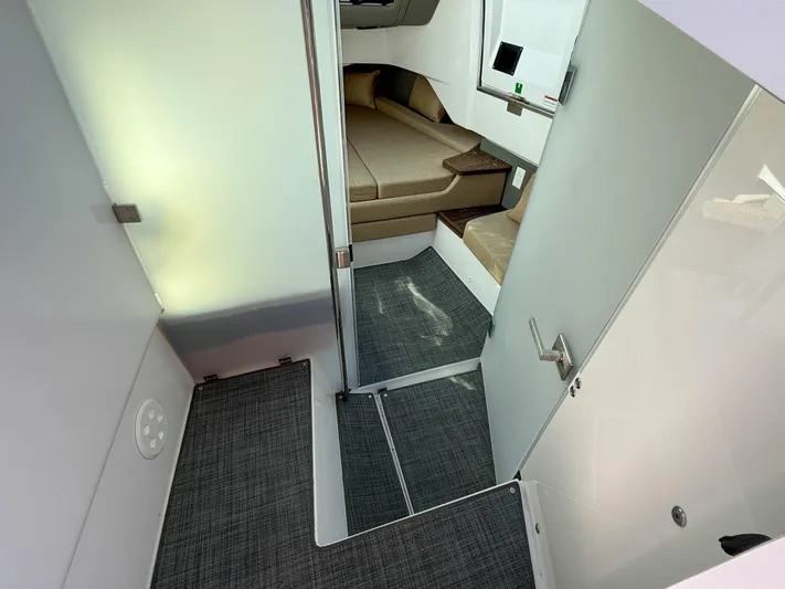  Yacht Photos Pics Interior cabin of 2022 Axopar 37 Sun Top with modern design and comfortable seating.