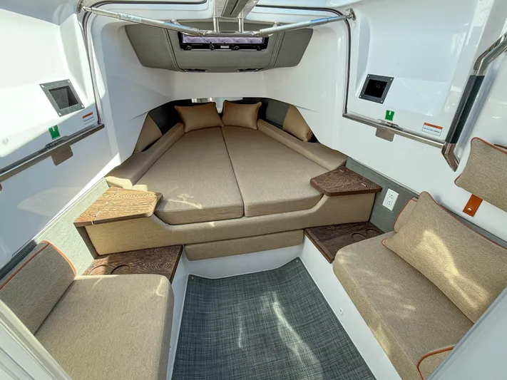  Yacht Photos Pics Luxurious interior of 2022 Axopar 37 Sun Top with comfortable seating and modern design.