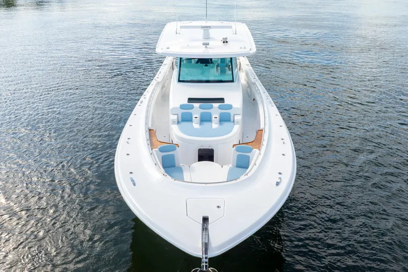  Yacht Photos Pics 2026 HCB 56 Suenos GIX luxury boat on calm water, top view.