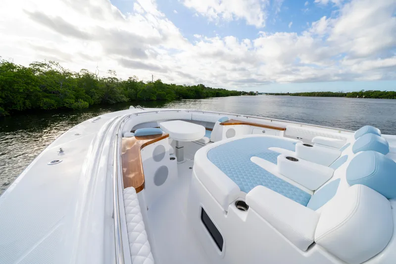  Yacht Photos Pics Luxurious 2026 HCB 56 Suenos GIX yacht with spacious seating and scenic water view.