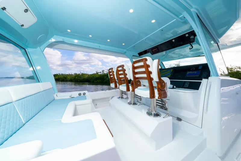  Yacht Photos Pics Luxurious interior of 2026 HCB 56 Suenos GIX yacht with elegant seating and modern design.