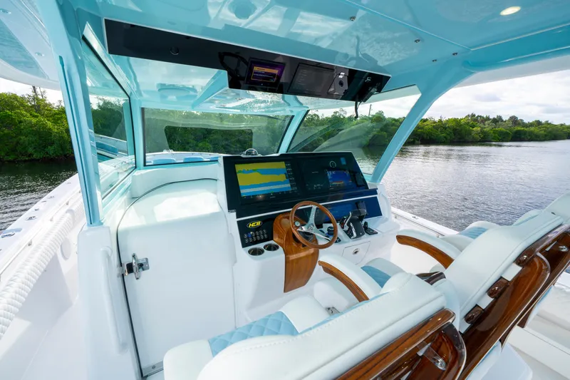  Yacht Photos Pics 2026 HCB 56 Suenos GIX helm with advanced navigation system and luxurious seating.