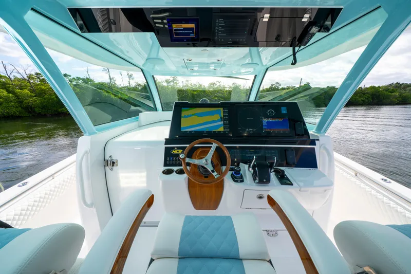  Yacht Photos Pics Luxurious helm of 2026 HCB 56 Suenos GIX with advanced navigation systems.