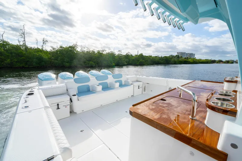  Yacht Photos Pics 2026 HCB 56 Suenos GIX luxury boat with sleek seating and polished wood accents.