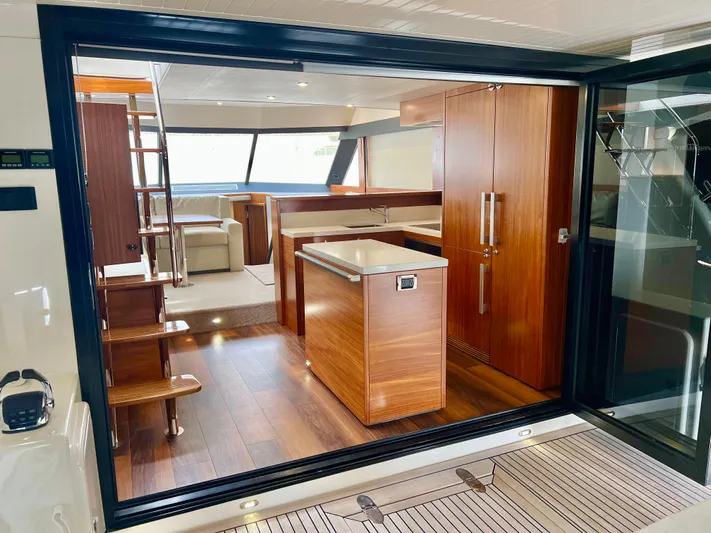  Yacht Photos Pics Interior of 2020 Maritimo M51 yacht with modern wood finishes and spacious layout.