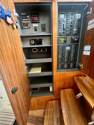  Yacht Photos Pics Electrical panel and storage shelves inside a 2020 Maritimo M51 yacht.