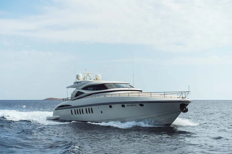 Allie Yacht Photos Pics 2008 Alalunga Open 85 Sport X yacht cruising on open sea.