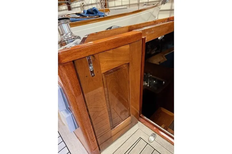 Bamboozle Yacht Photos Pics Wooden cabin door on 2010 Spirit Yachts R46 sailboat, showcasing elegant craftsmanship.