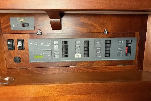 Bamboozle Yacht Photos Pics Control panel of a 2010 Spirit Yachts R46, featuring switches and indicators.
