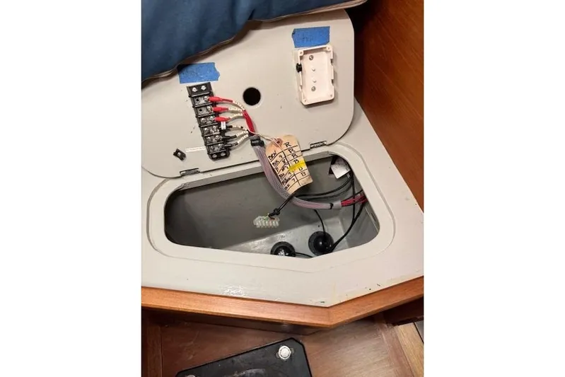 Bamboozle Yacht Photos Pics Electrical panel inside 2010 Spirit Yachts R46, showcasing wiring and connections.