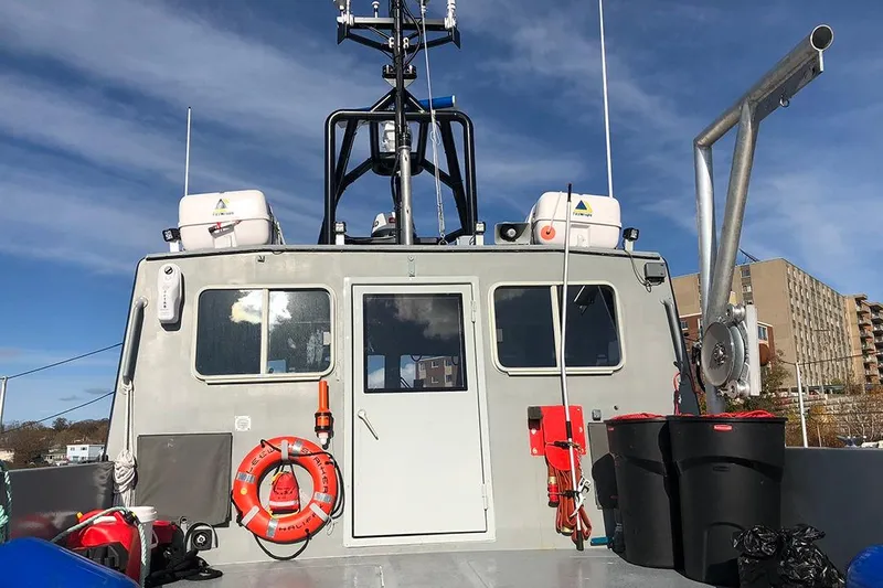 Interceptor Yacht Photos Pics River Hawk 73 Sea Stryker Fast Patrol Boat, 2012, docked with safety equipment visible.