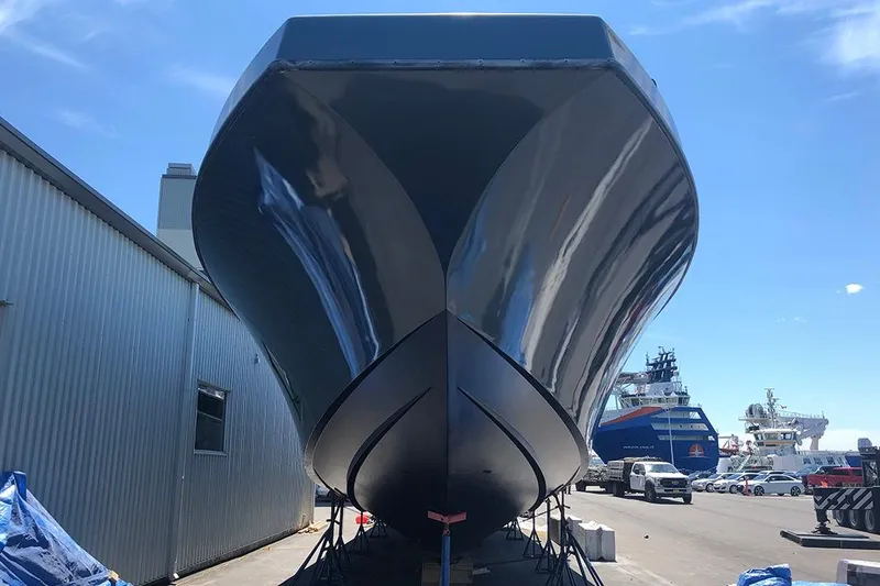 Interceptor Yacht Photos Pics River Hawk 73 Sea Stryker Fast Patrol Boat, 2012, docked at shipyard under clear sky.