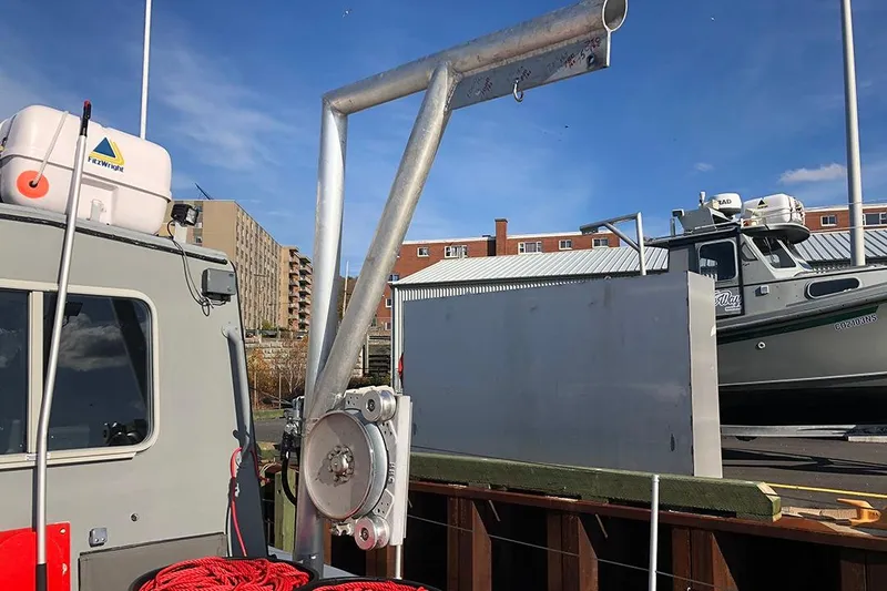 Interceptor Yacht Photos Pics River Hawk 73 Sea Stryker Fast Patrol Boat, 2012, docked with equipment visible.