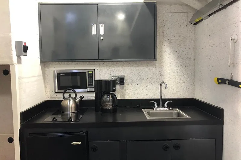 Interceptor Yacht Photos Pics Compact kitchen area on 2012 River Hawk 73 Sea Stryker Fast Patrol Boat.