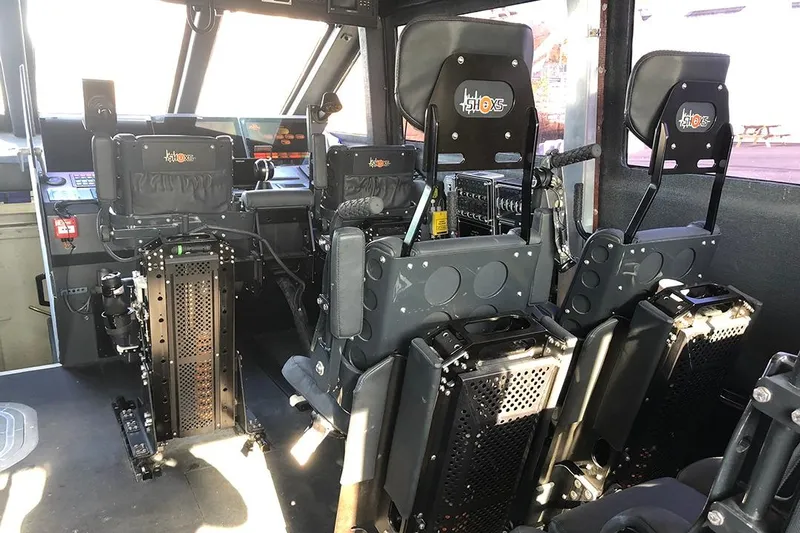 Interceptor Yacht Photos Pics Interior of 2012 River Hawk 73 Sea Stryker Fast Patrol Boat with advanced seating and controls.