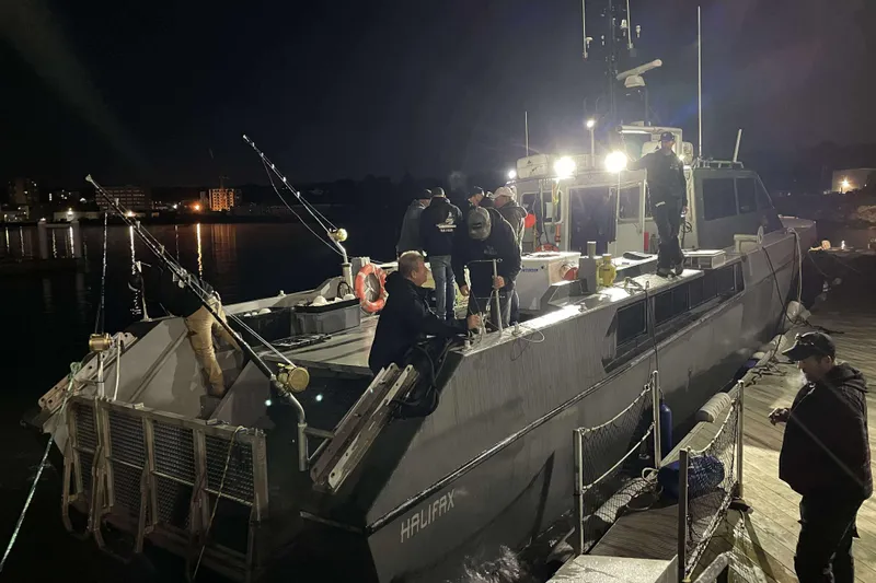 Interceptor Yacht Photos Pics River Hawk 73 Sea Stryker Fast Patrol Boat docked at night, 2012 model.