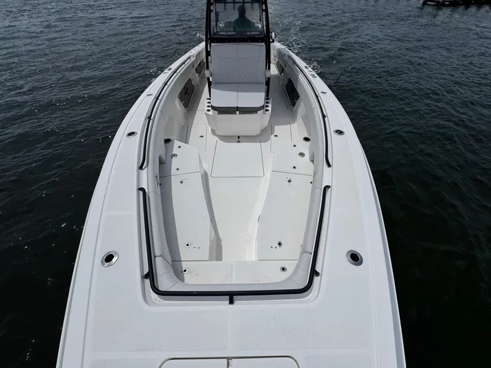  Yacht Photos Pics 2022 Fountain 38TE boat on water, showcasing sleek design and spacious deck.