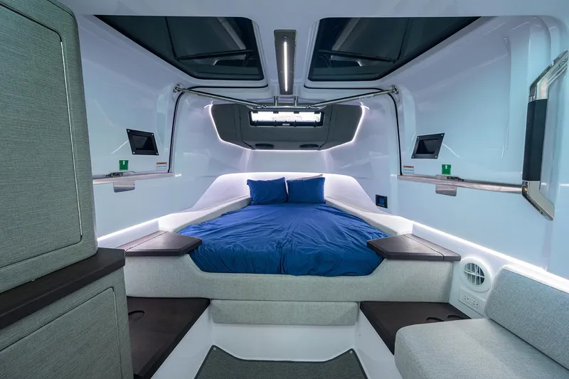  Yacht Photos Pics 2024 Axopar XC Cross Cabin Brabus interior with modern bed and sleek design.