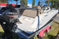 2016 Quicksilver Activ 605 Open boat with Mercury engine on trailer.