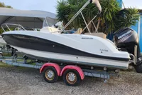 2016 Quicksilver Activ 605 Open boat on trailer with Mercury engine.