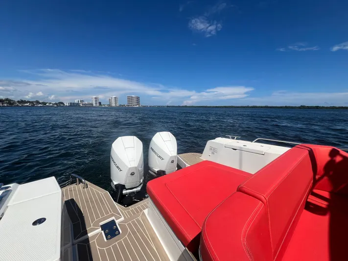 Fla#98 Yacht Photos Pics Nimbus T11 #98 TRADE! 2022 boat with red seating, dual engines, ocean view.