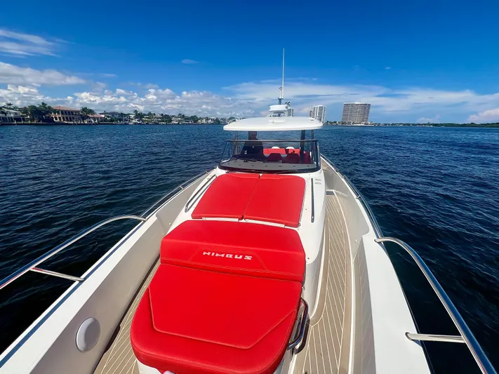 Fla#98 Yacht Photos Pics Nimbus T11 #98 TRADE! 2022 boat with red seating on open water.