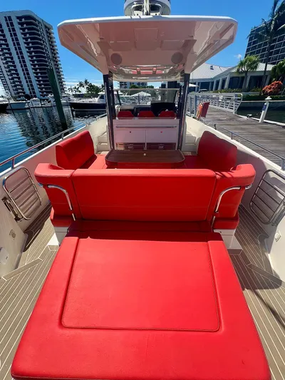Fla#98 Yacht Photos Pics Red seating on 2022 Nimbus T11 #98 TRADE! boat docked at marina.