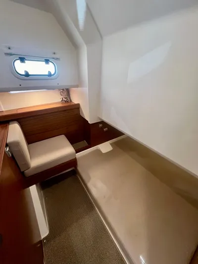 Fla#98 Yacht Photos Pics Interior cabin of 2022 Nimbus T11 #98 TRADE! with seating and window.