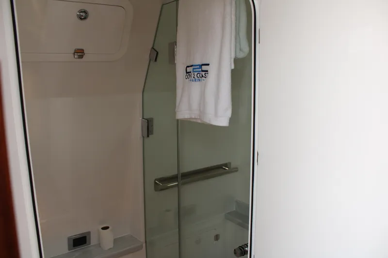 Hcb 53' Suenos Yacht Photos Pics 2024 HCB Suenos bathroom with glass door and towel.
