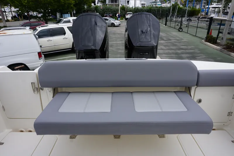 Bwce0497i324 Yacht Photos Pics 2024 Boston Whaler 360 Outrage boat with dual outboard engines and rear seating.