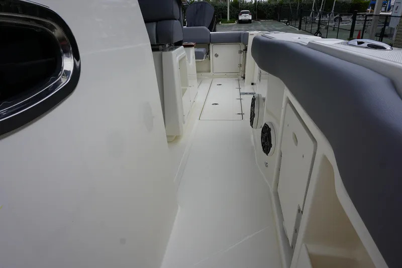 Bwce0497i324 Yacht Photos Pics 2024 Boston Whaler 360 Outrage boat interior, featuring spacious deck and seating.