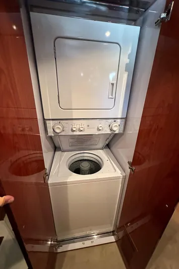 Euphoria Yacht Photos Pics Stacked washer and dryer in wooden cabinet, Johnson 70 model, 2001.