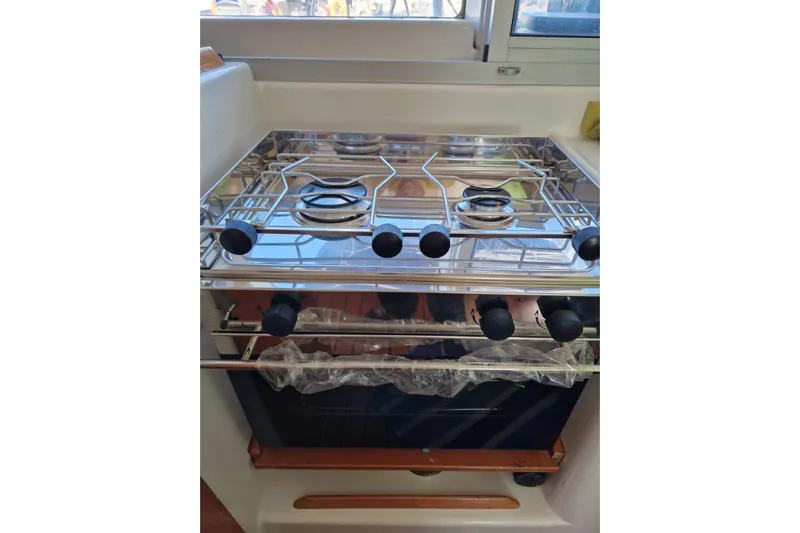 Lagoon 380 Yacht Photos Pics Stainless steel stove in 2002 Lagoon 380 catamaran kitchen area.