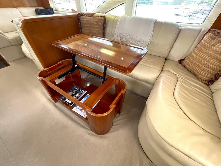 Rudee's Ruckus Yacht Photos Pics SALON COFFEE TABLE W/HI/LO ACTUATORS