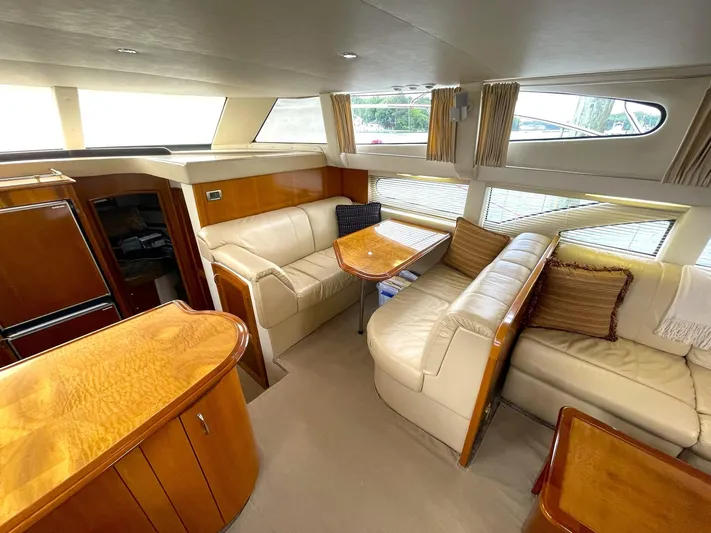 Rudee's Ruckus Yacht Photos Pics FORWARD FACING DINETTE TO STBD. FORWARD