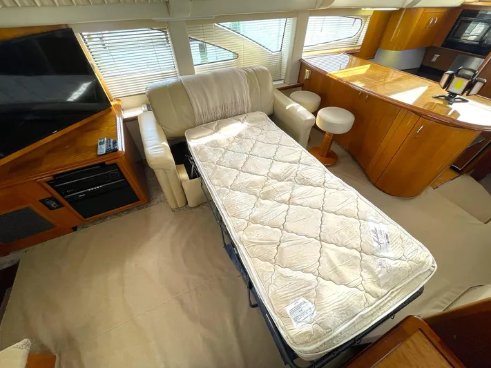 Rudee's Ruckus Yacht Photos Pics SALON SOFA TO PORT WITH FOLD OUT BED