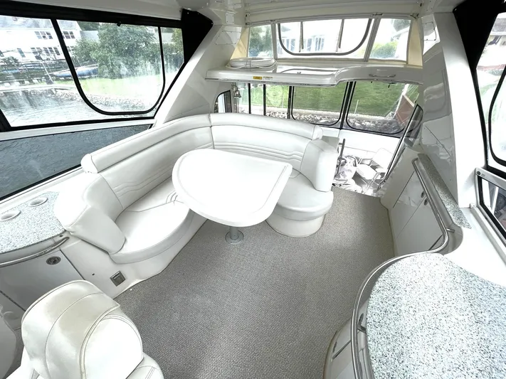 Rudee's Ruckus Yacht Photos Pics BRIDGE L-SHAPED LOUNGE SEATING W/TABLE