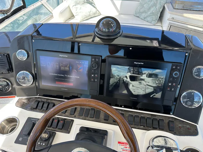  Yacht Photos Pics Helm of 2008 Sea Ray 47 Sedan Bridge with dual Raymarine displays.
