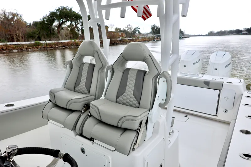  Yacht Photos Pics 2023 Cape Horn 34 XS boat with luxurious seating and dual outboard engines.