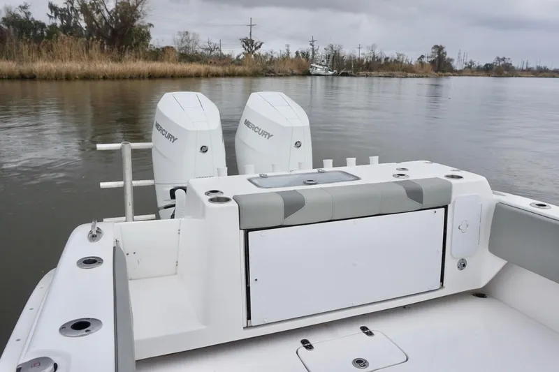  Yacht Photos Pics 2023 Cape Horn 34 XS boat with dual Mercury engines on a calm river.