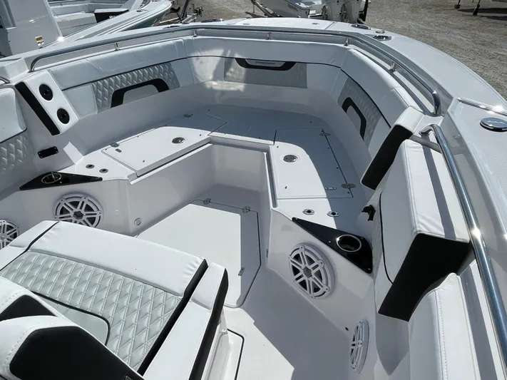 Med Blue Yacht Photos Pics 2025 Blackfin 272CC boat interior with sleek seating and modern design.