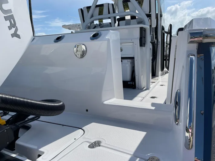 Med Blue Yacht Photos Pics 2025 Blackfin 272CC boat interior with sleek white design and modern features.