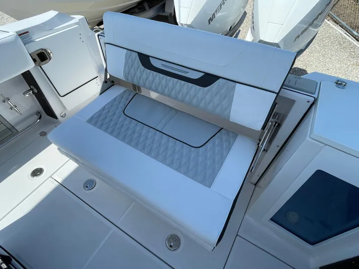 Med Blue Yacht Photos Pics 2025 Blackfin 272CC boat with sleek seating and modern design.