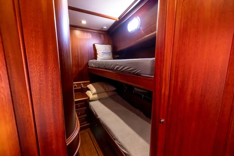 Essence Yacht Photos Pics Bunk beds in 2006 Vicem 85 Classic yacht cabin with rich wood paneling.
